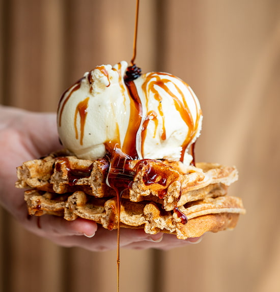 Vanilla ice cream on syrup-covered waffle